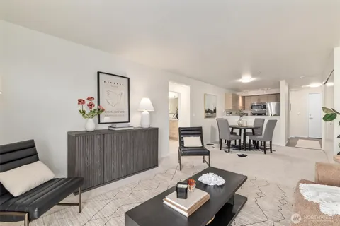 a bedroom with a bed and a lamp