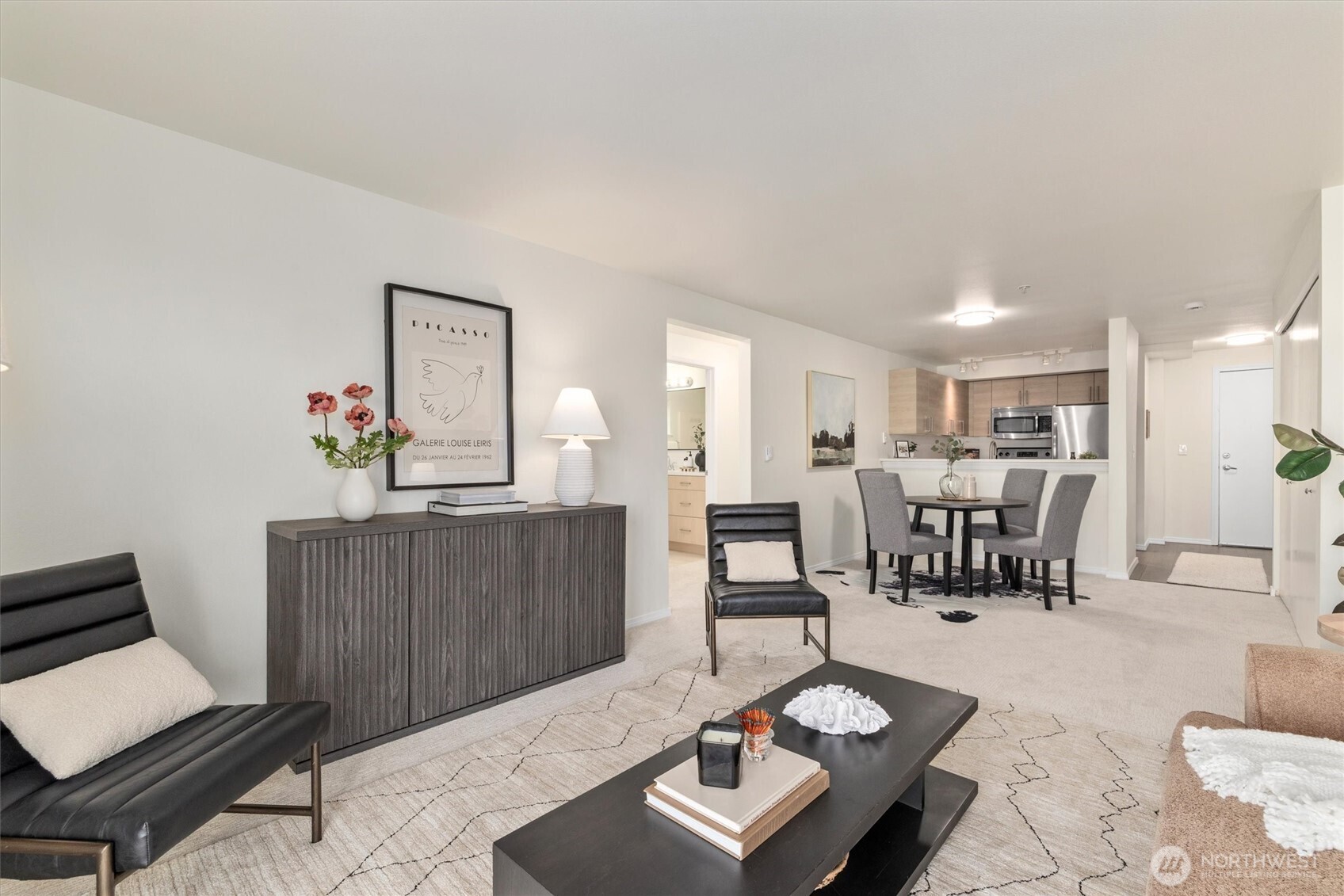 2901 South Jackson Street, Unit 507 Seattle, WA 98144 - Photo 9 of 29 a living room with furniture and wooden floor