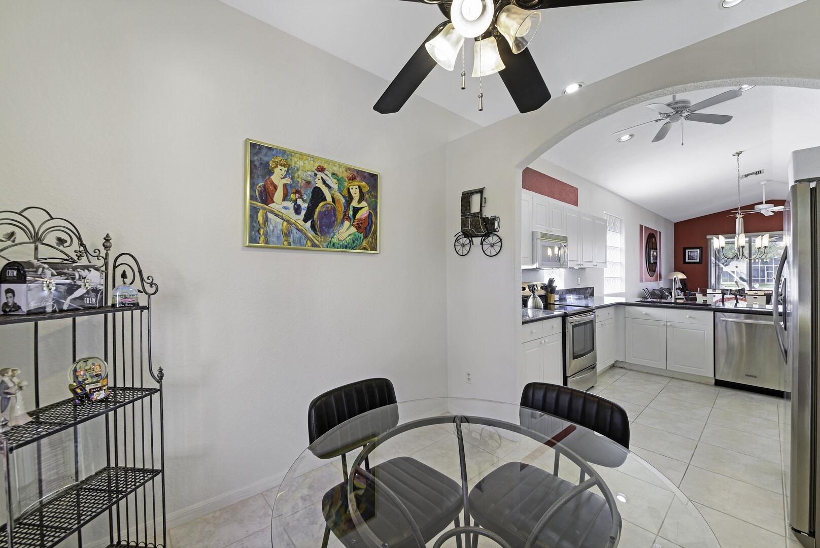 8214 Bellafiore Way Boynton Beach, FL 33472 - Photo 10 of 35 a view of a livingroom with furniture and a ceiling fan