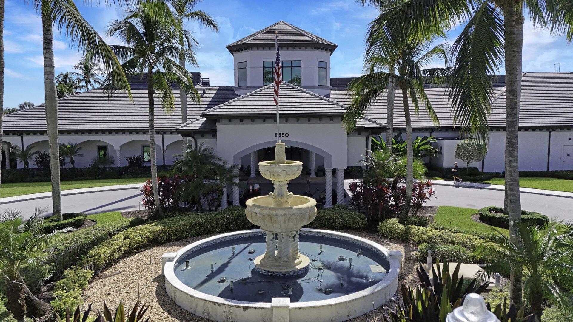 8214 Bellafiore Way Boynton Beach, FL 33472 - Photo 25 of 35 a view of a house with a swimming pool