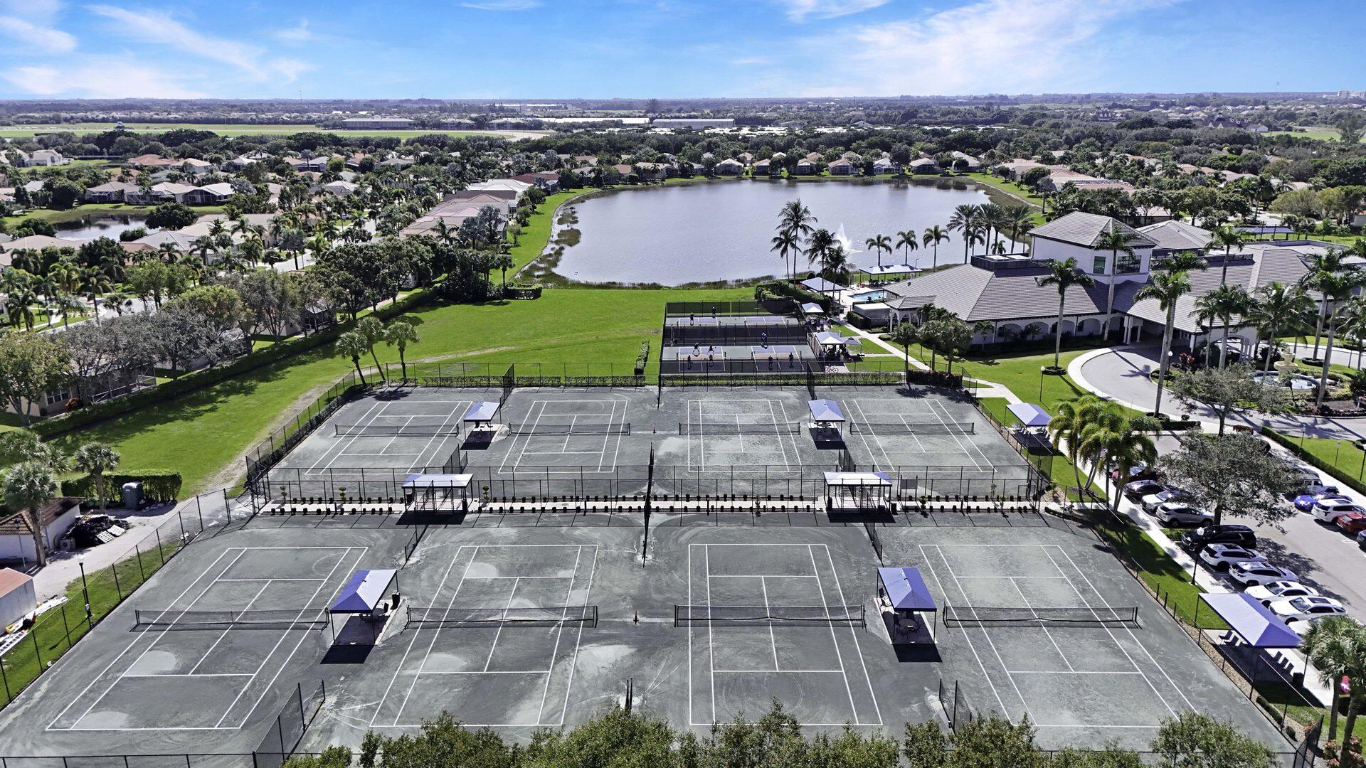 8214 Bellafiore Way Boynton Beach, FL 33472 - Photo 26 of 35 an aerial view of a city with houses