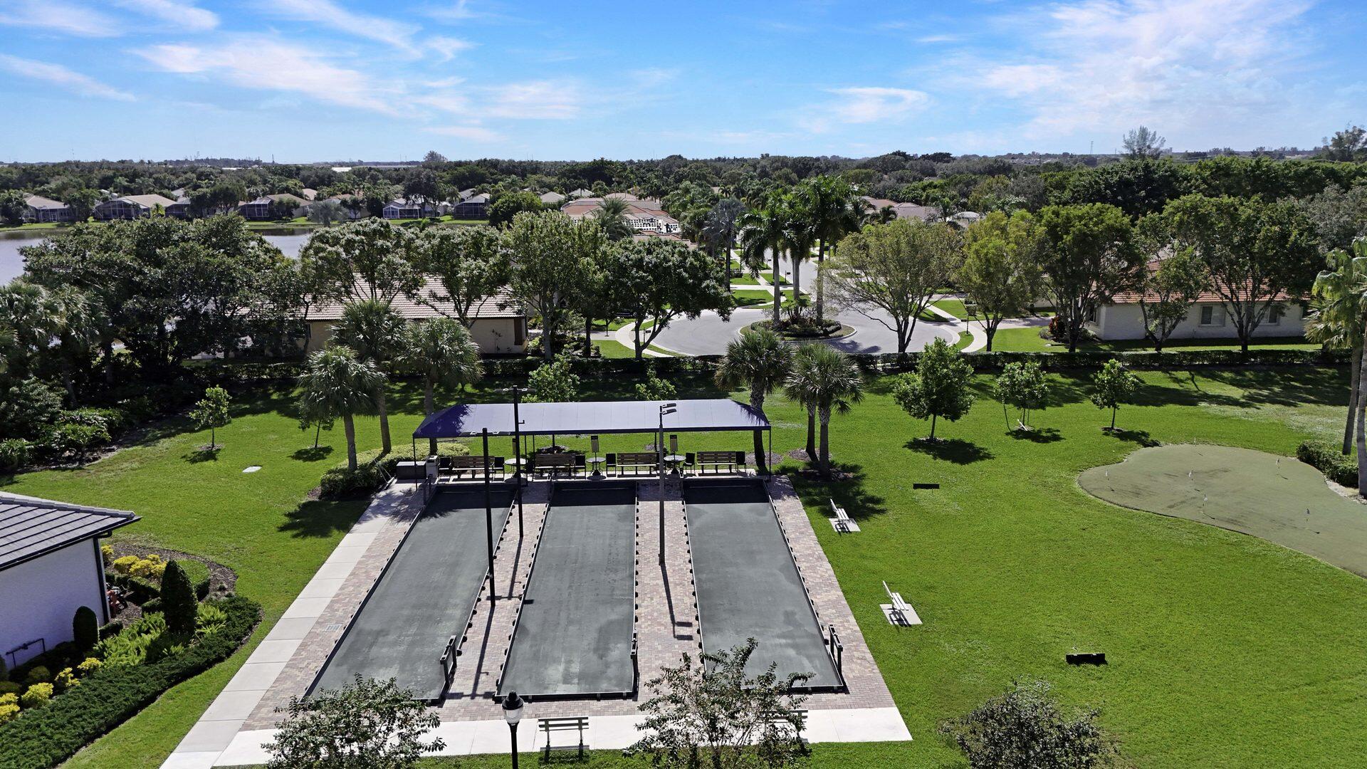 8214 Bellafiore Way Boynton Beach, FL 33472 - Photo 28 of 35 an aerial view of a house with a yard