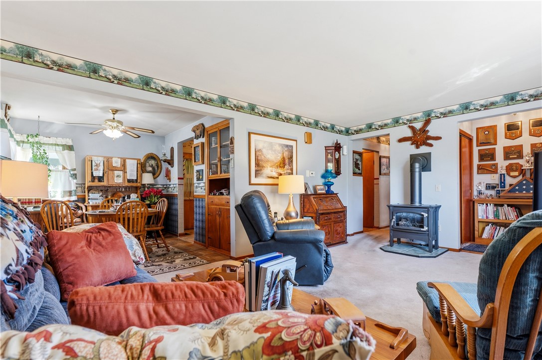 3892 Gaines Basin Road Albion, NY 14411 - Photo 11 of 38 Family Room with Propane Stove