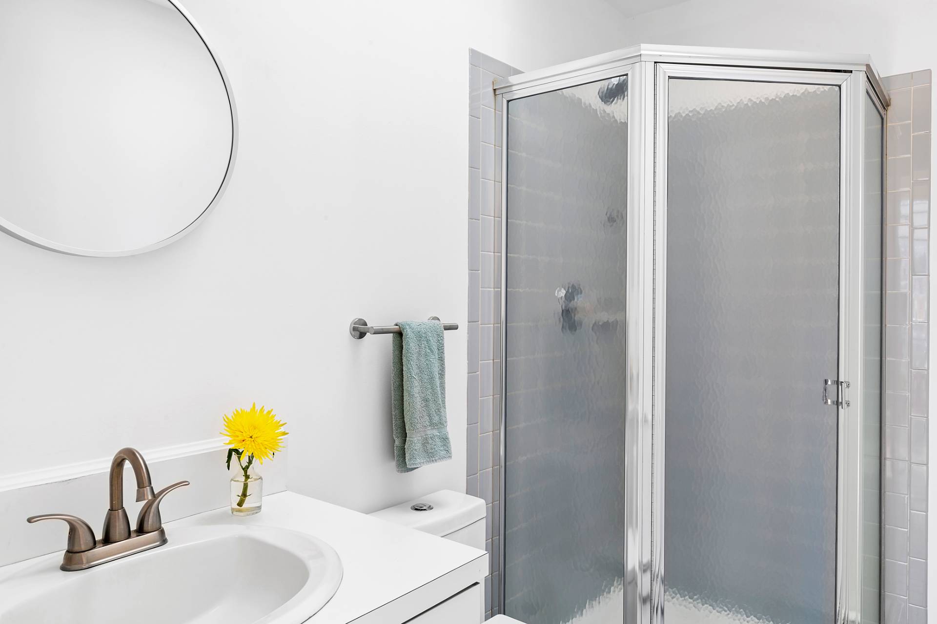 74 Hildreth Place East Hampton, NY 11937 - Photo 12 of 14 a bathroom with a sink and a mirror