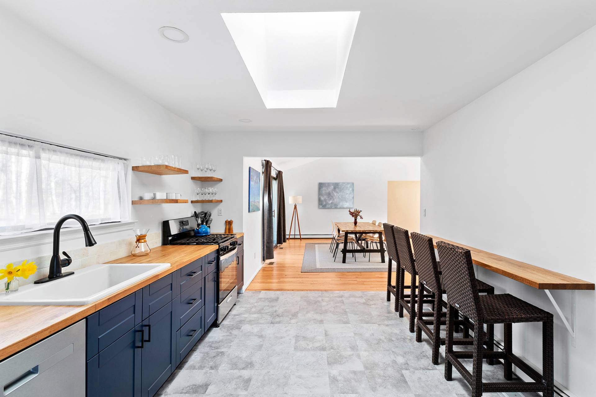 74 Hildreth Place East Hampton, NY 11937 - Photo 3 of 14 a large kitchen with lots of counter space and a sink