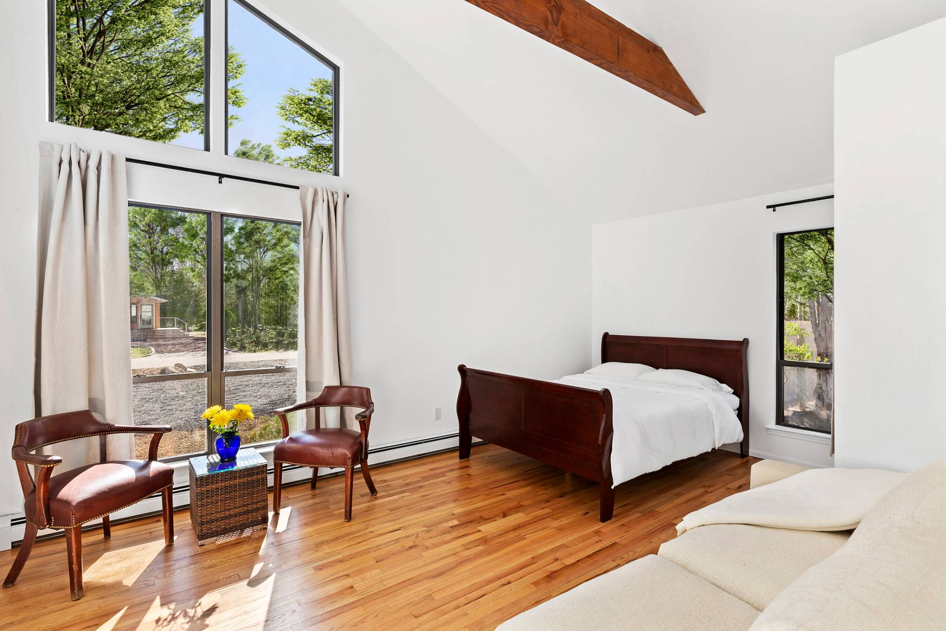 74 Hildreth Place East Hampton, NY 11937 - Photo 7 of 14 a bedroom with a bed and a window