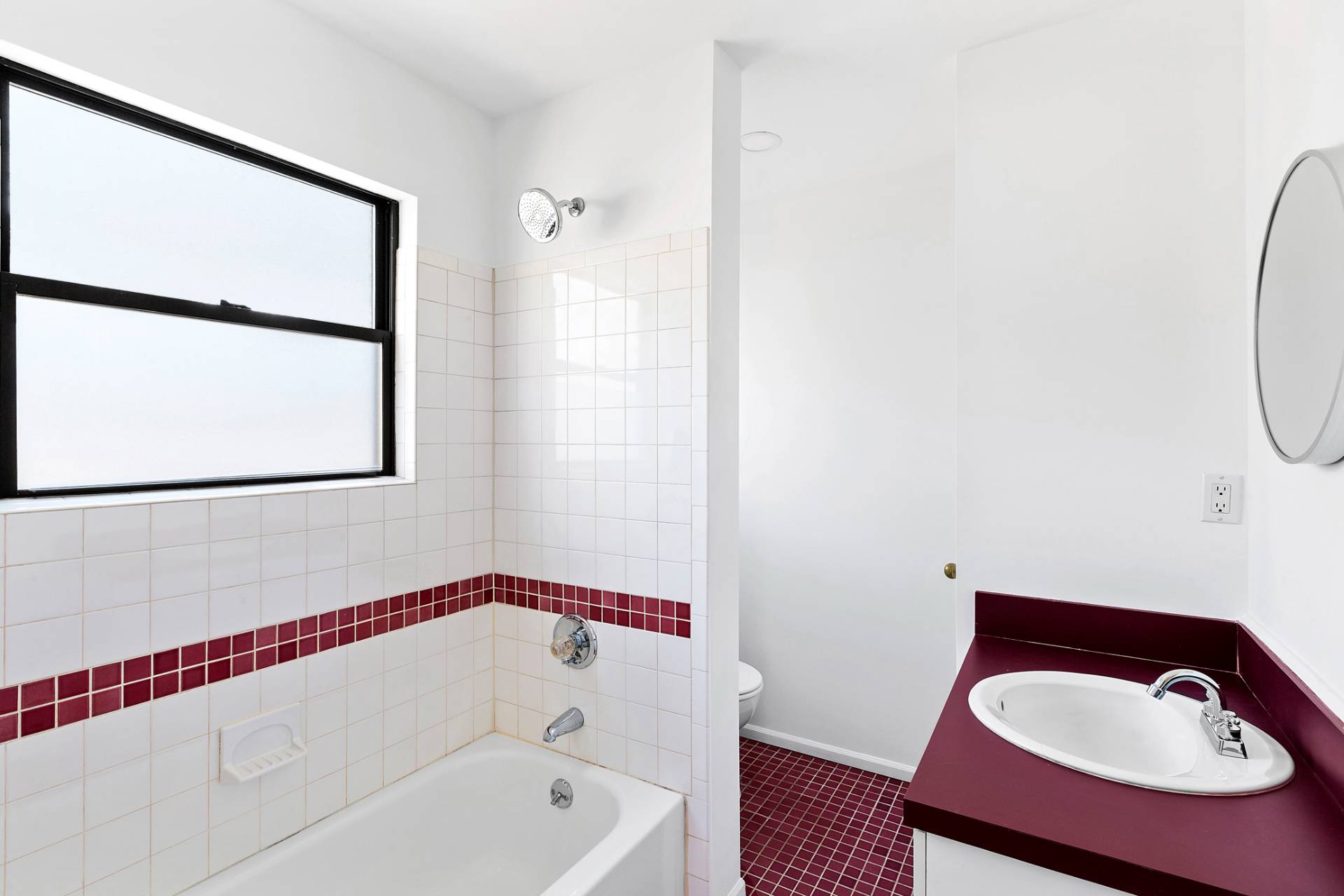 74 Hildreth Place East Hampton, NY 11937 - Photo 10 of 14 a bathroom with a tub and a window