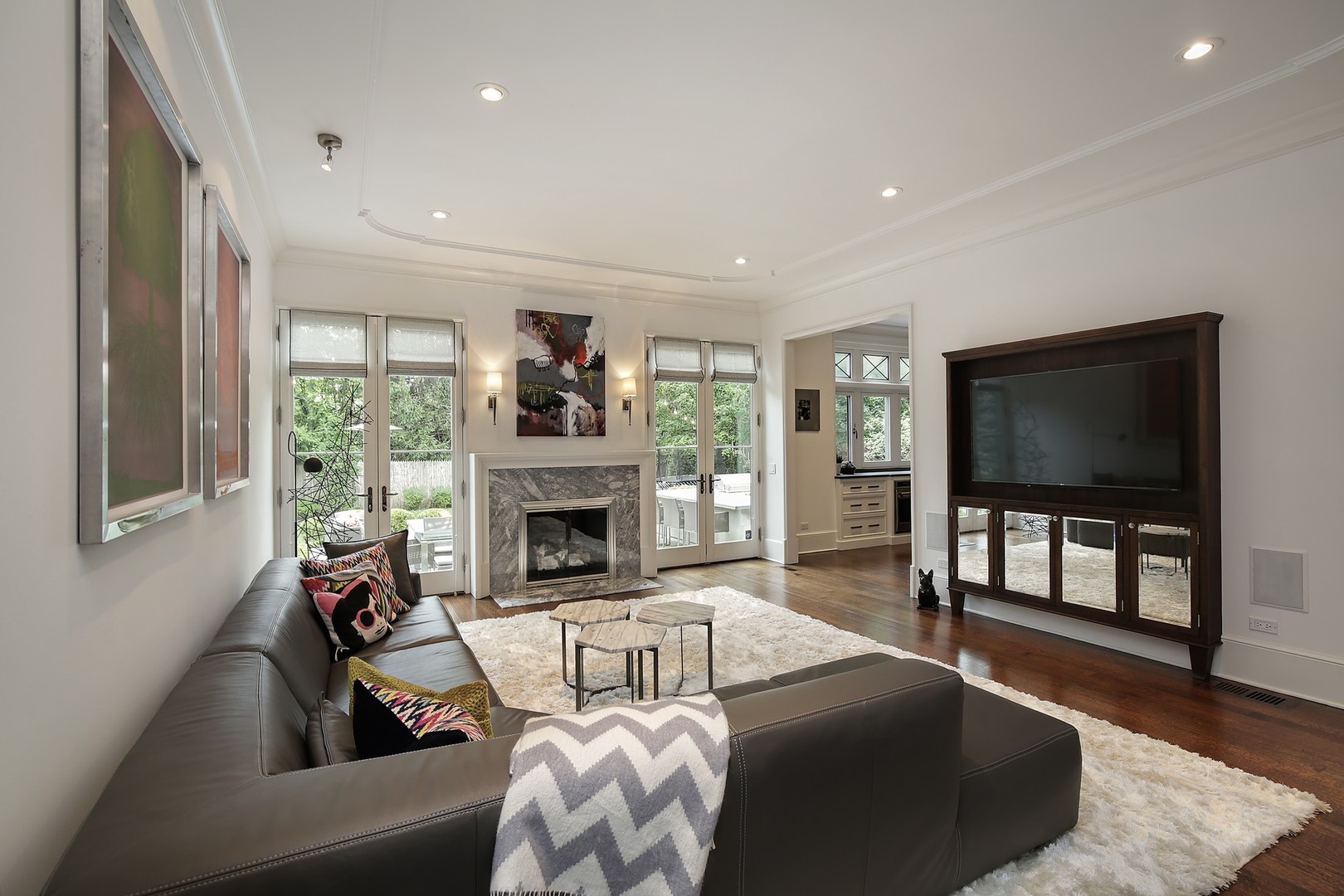 127 Old Green Bay Road Winnetka, IL 60093 - Photo 11 of 33 a living room with furniture and a flat screen tv