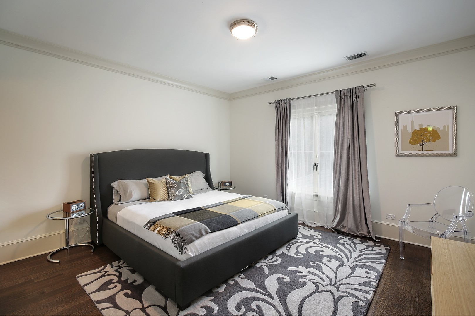 127 Old Green Bay Road Winnetka, IL 60093 - Photo 16 of 33 a bedroom with a bed and wooden floor