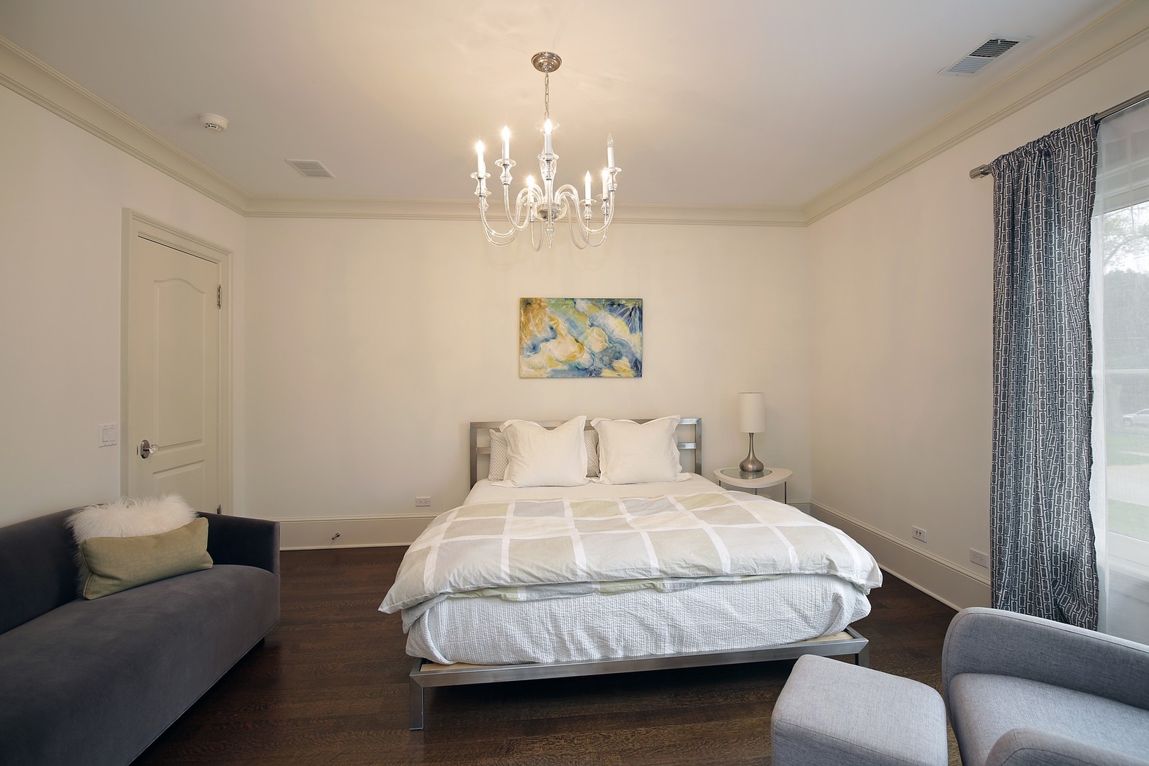 127 Old Green Bay Road Winnetka, IL 60093 - Photo 17 of 33 a bedroom with a bed chandelier and a couch