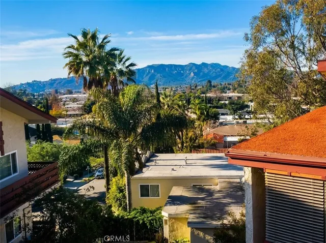 a view of a chairs and table in the patio