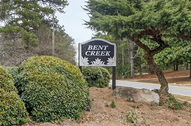 a sign on the side of the road