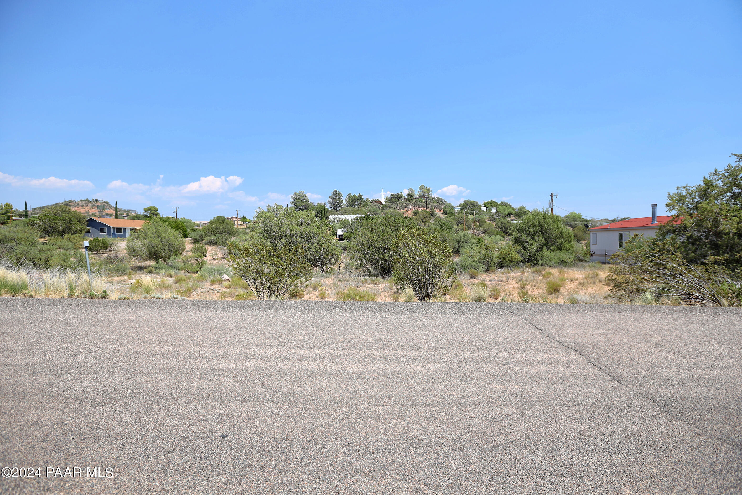 4595 Quail Hollow Road Rimrock, AZ 86335 - Photo 5 of 30 a view of a field with trees in the background