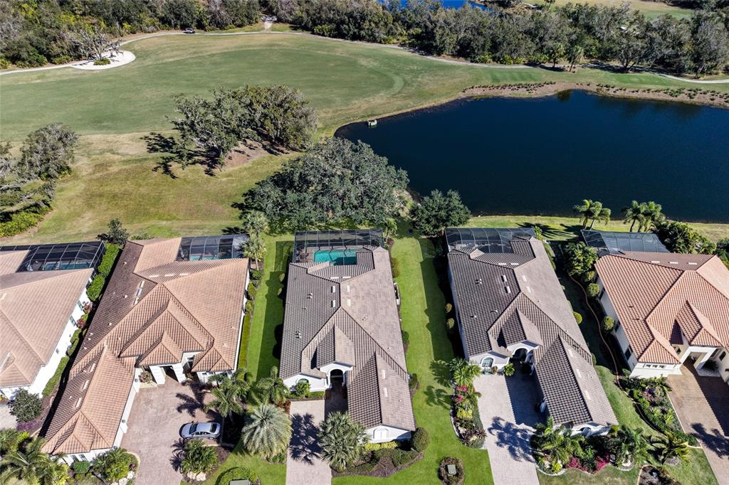 5013 Benito Court Lakewood Ranch, FL 34211 - Photo 1 of 1 an aerial view of a house with a yard