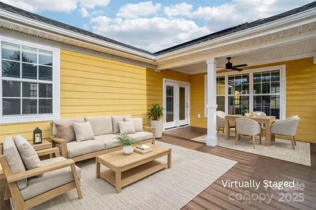 a balcony with furniture and window