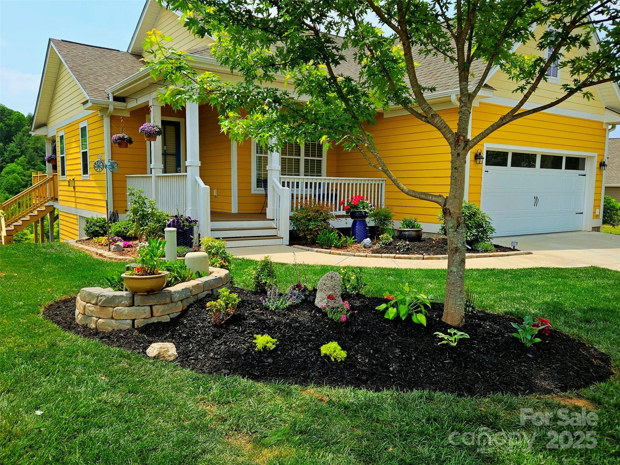 14 Rose Creek Road Leicester, NC 28748 - Photo 3 of 34 a view of a house with a backyard and garden