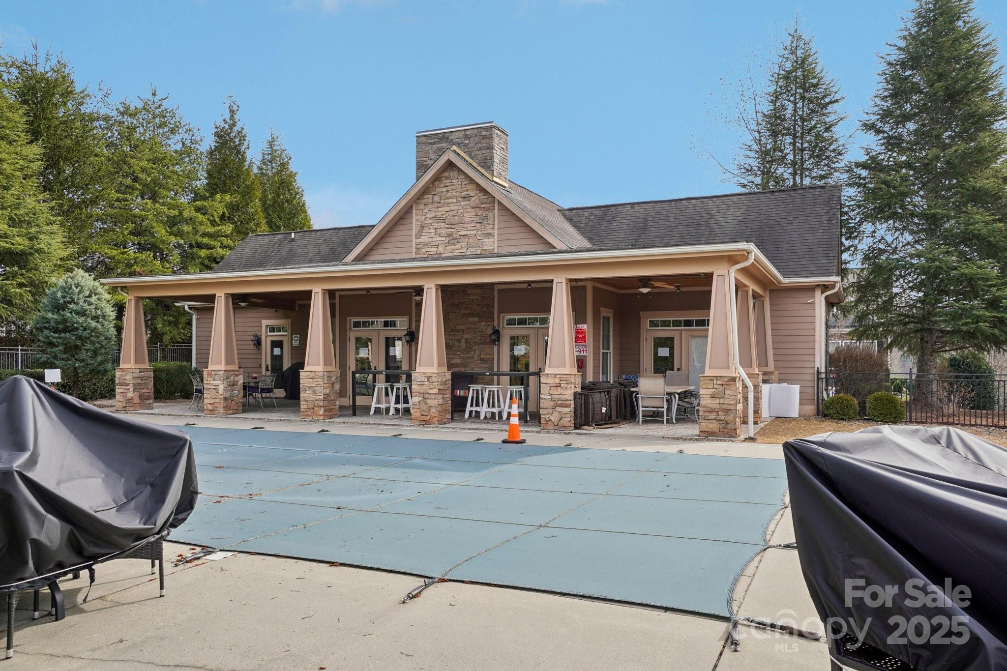 14 Rose Creek Road Leicester, NC 28748 - Photo 33 of 34 a view of a house with backyard sitting area and porch