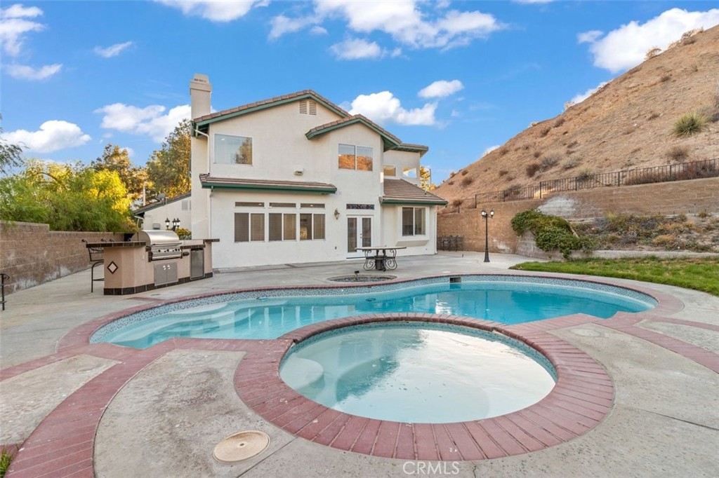 14439 Grandifloras Road Canyon Country, CA 91387 - Photo 2 of 44 back of the house