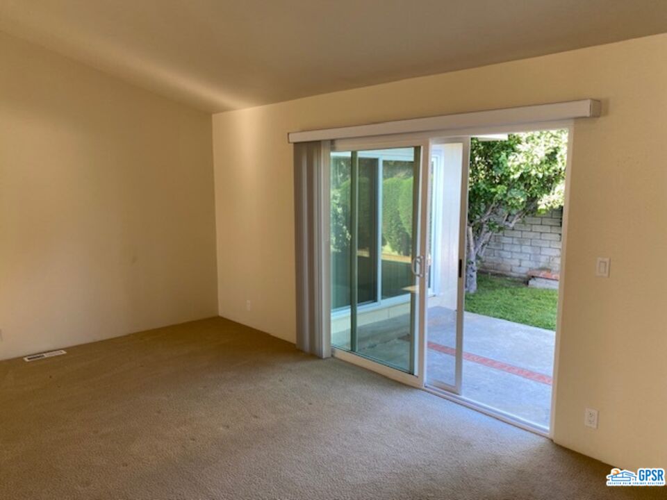 3522 Amber Lane Oceanside, CA 92056 - Photo 12 of 33 a view of an empty room with glass door