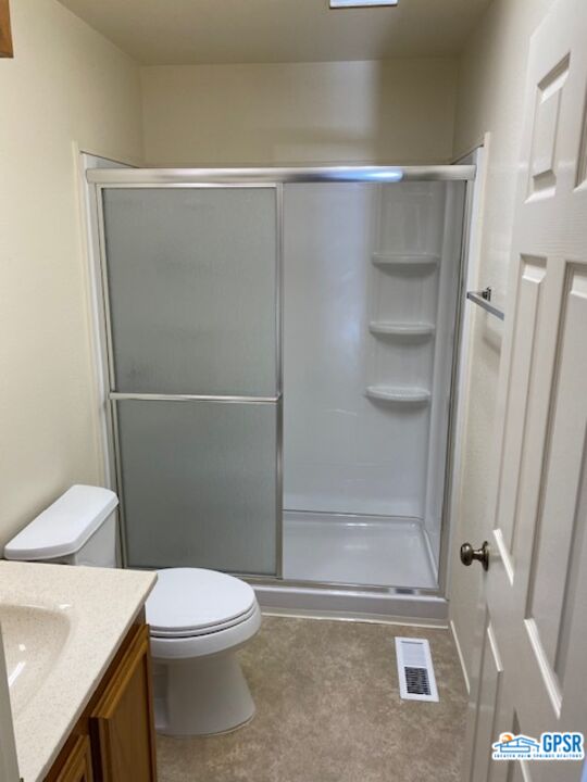 3522 Amber Lane Oceanside, CA 92056 - Photo 24 of 33 a white toilet sitting next to a shower