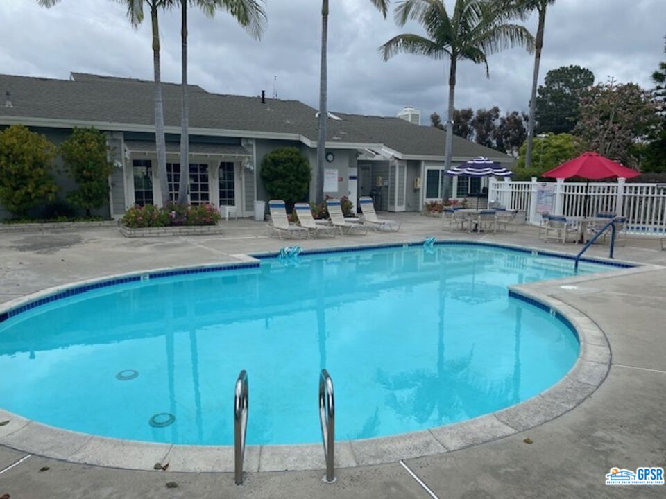 3522 Amber Lane Oceanside, CA 92056 - Photo 27 of 33 a view of a patio with swimming pool table and chairs