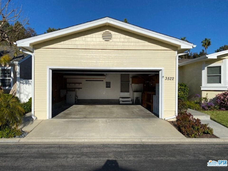 3522 Amber Lane Oceanside, CA 92056 - Photo 30 of 33 a front view of a house with garage