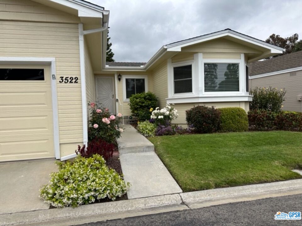 3522 Amber Lane Oceanside, CA 92056 - Photo 3 of 33 a front view of a house with a yard
