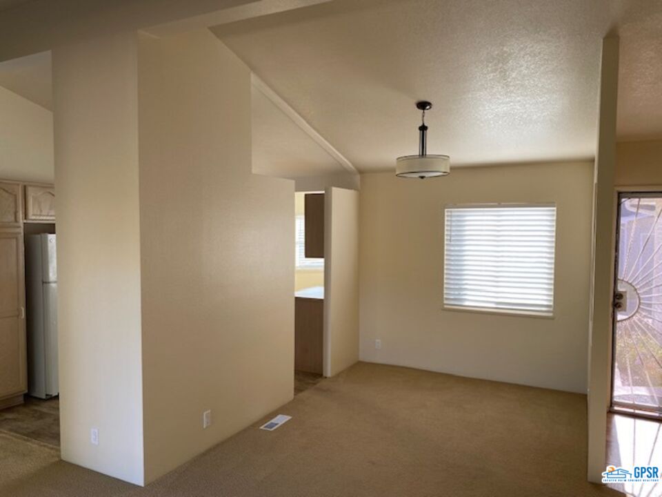 3522 Amber Lane Oceanside, CA 92056 - Photo 6 of 33 a view of an empty room with a window