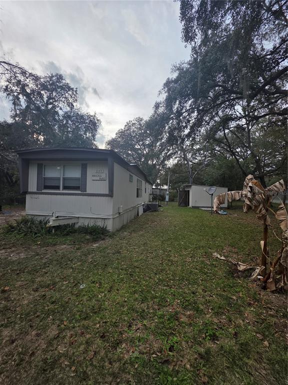 205 Little Star Road Hawthorne, FL 32640 - Photo 3 of 11 a view of a house with a yard