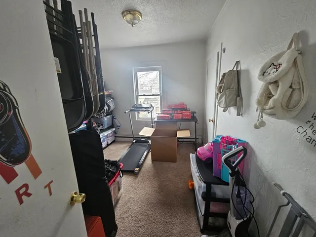 a view of a workspace with furniture and toys