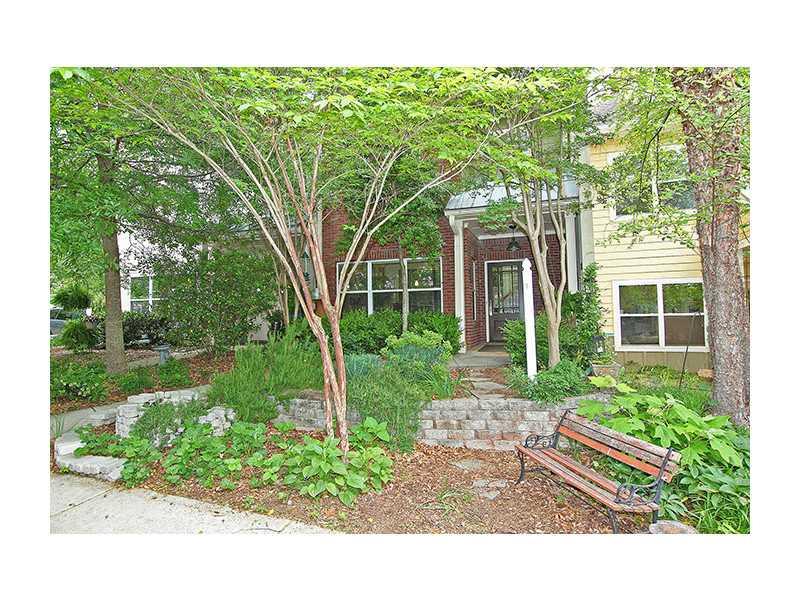 702 Dancing Fox Road, Unit 702 Decatur, GA 30032 - Photo 1 of 1 Exterior Front. Front of townhouse is both brick and durable cement siding (that looks like wood). It has a welcoming entrance and a very peaceful feel. Beautiful trees just make it hard to photograph!