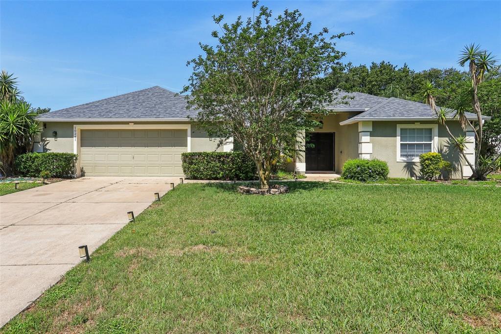 front view of a house and a yard