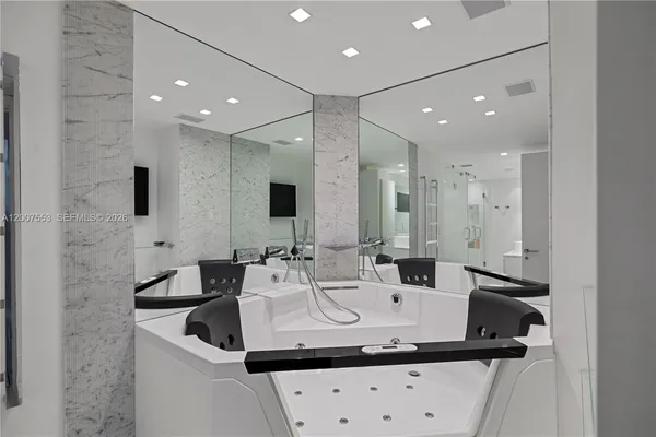 a bathroom with a double vanity sink and mirror