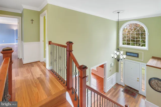 a view of entryway with wooden floor