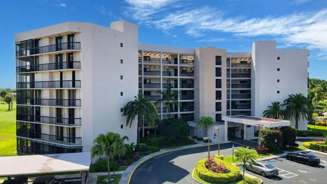 a view of a city with tall buildings and a fountain