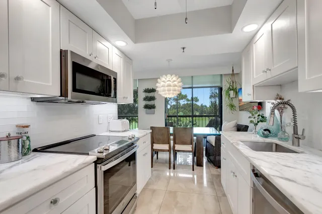 a view of balcony with furniture