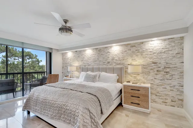 a view of a balcony with furniture