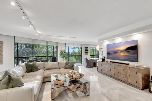 a kitchen with a sink stove and microwave