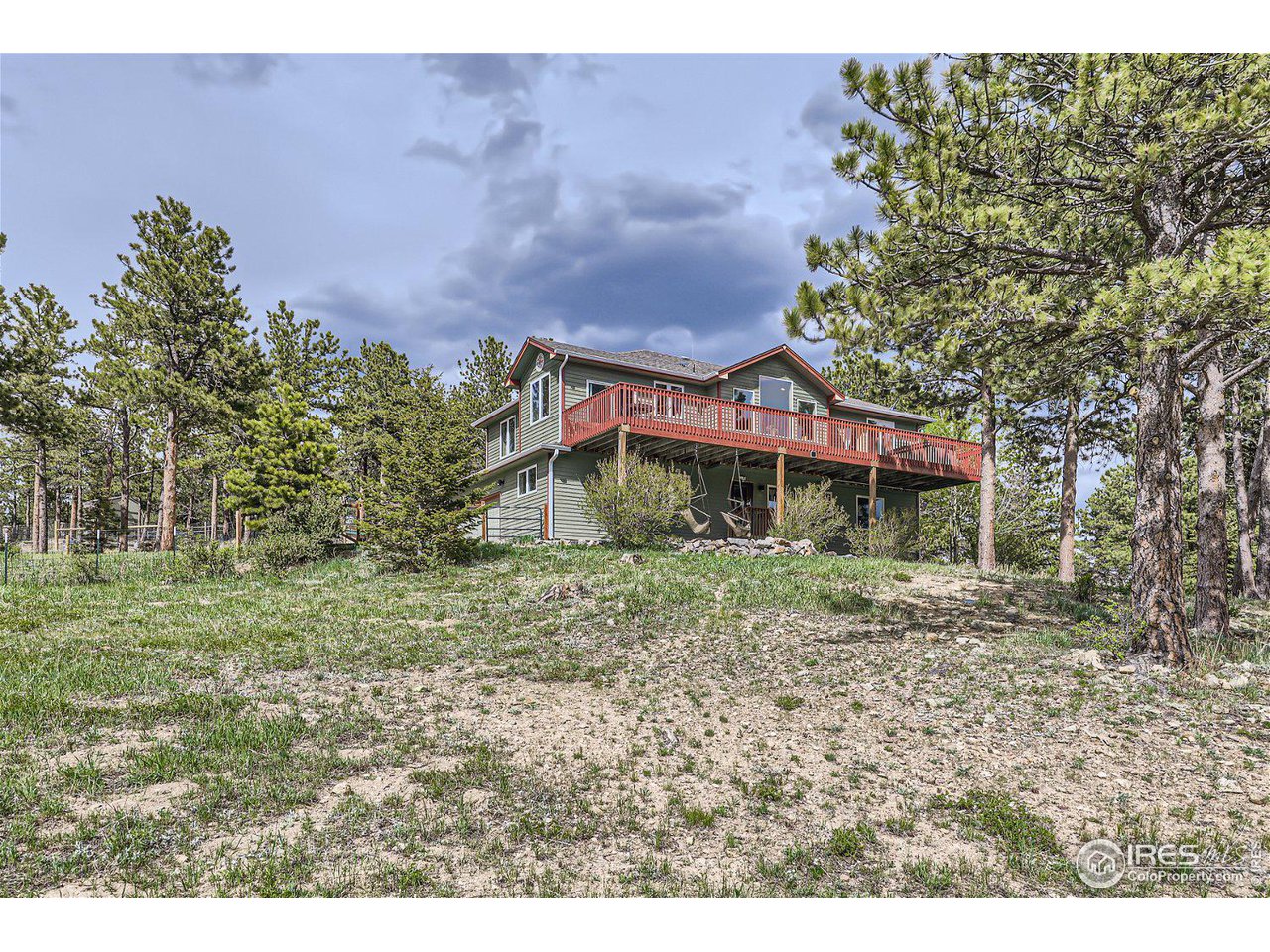 641 Ranch Road Ward, CO 80481 - Photo 5 of 40 a house view with a garden space