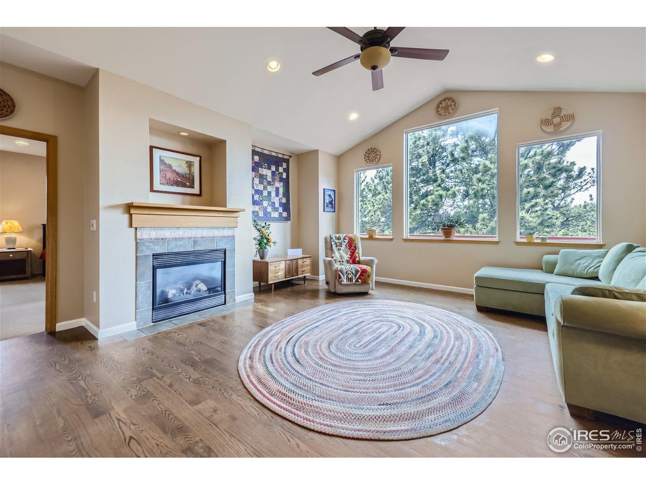 641 Ranch Road Ward, CO 80481 - Photo 7 of 40 a living room with furniture and a fireplace