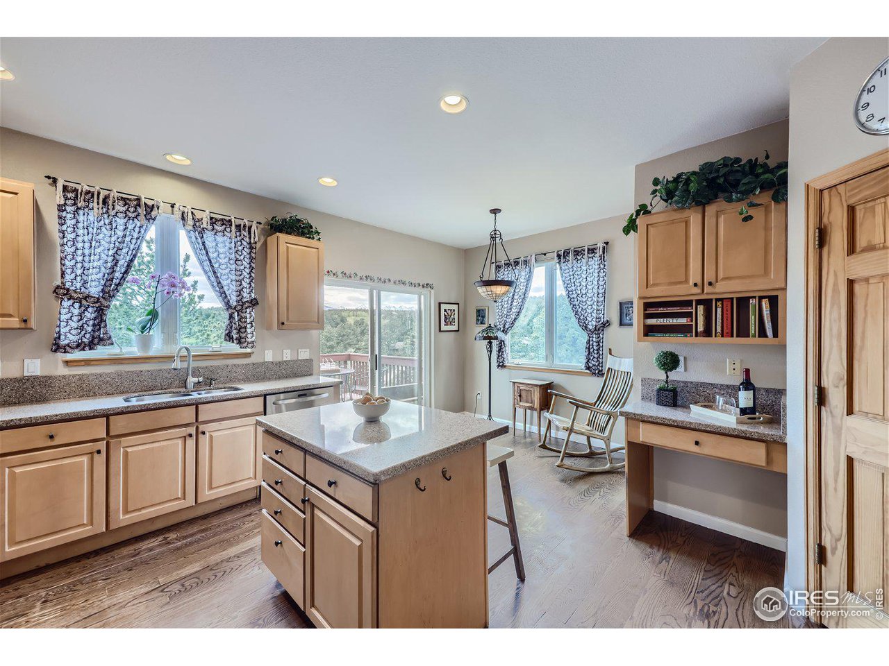 641 Ranch Road Ward, CO 80481 - Photo 9 of 40 a kitchen with a sink stove and cabinets
