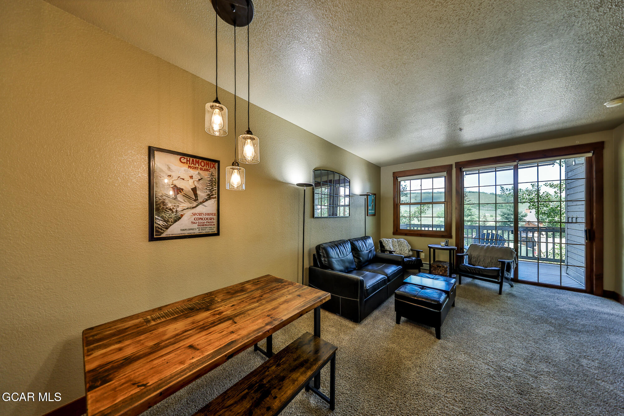 5202 Northstar, Unit 5202 Granby, CO 80446 - Photo 13 of 42 a bedroom with furniture and a window