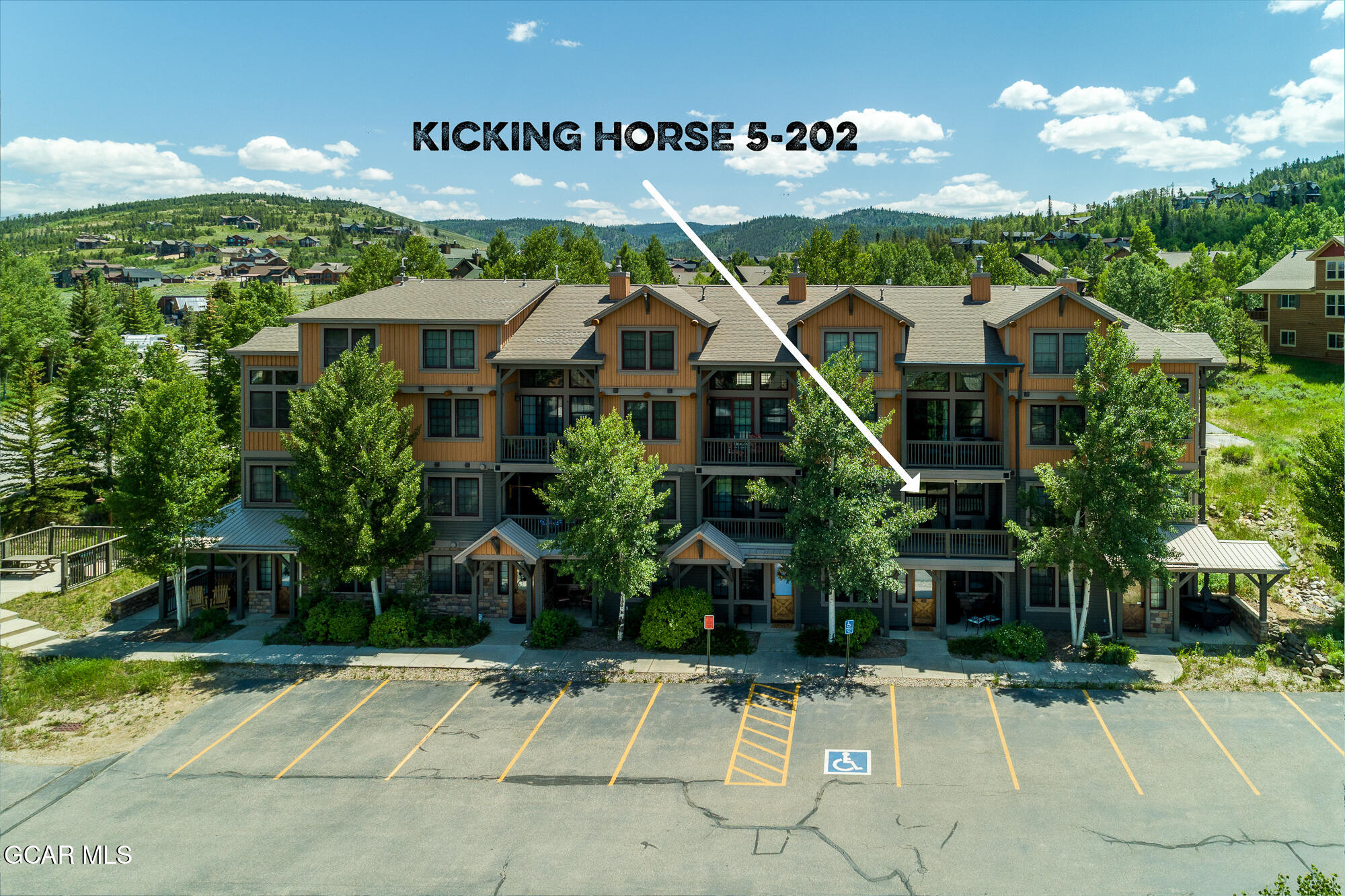 5202 Northstar, Unit 5202 Granby, CO 80446 - Photo 2 of 42 a front view of a house with a yard