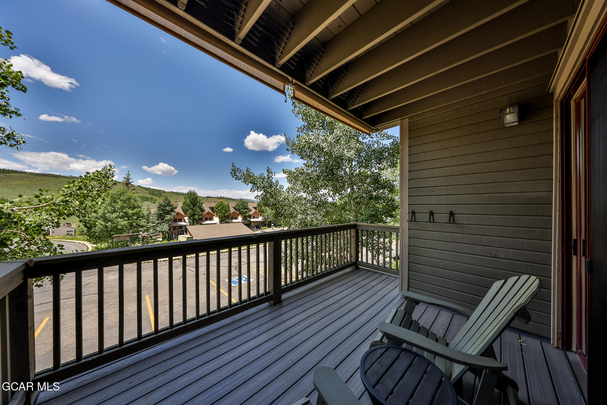 5202 Northstar, Unit 5202 Granby, CO 80446 - Photo 26 of 42 a view of a balcony with wooden floor