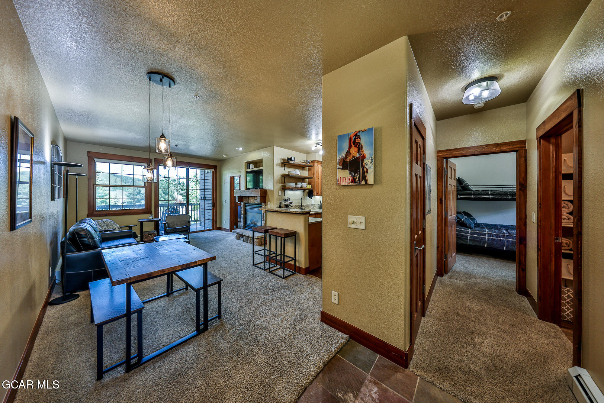 5202 Northstar, Unit 5202 Granby, CO 80446 - Photo 3 of 42 a room with furniture and a gate
