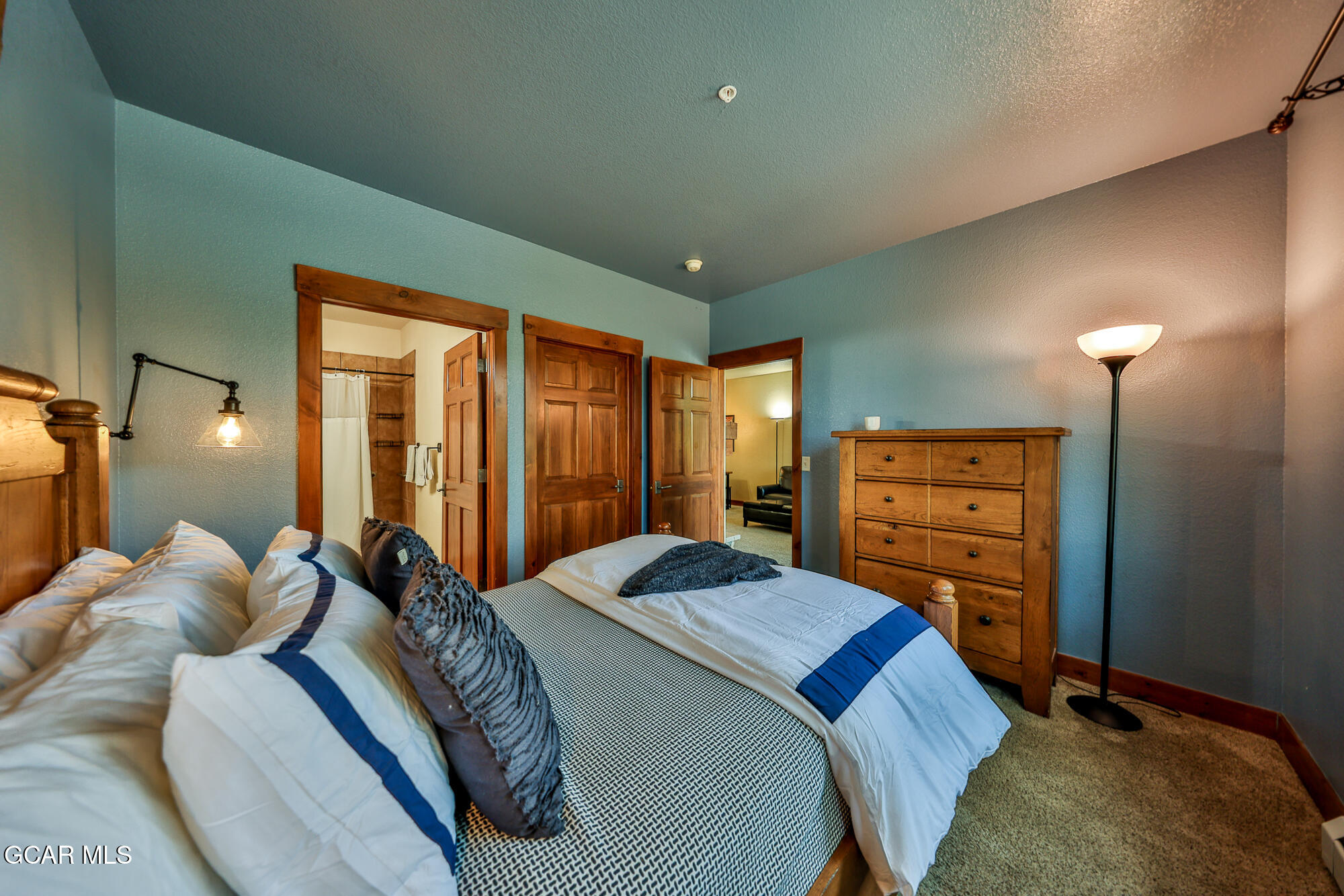 5202 Northstar, Unit 5202 Granby, CO 80446 - Photo 31 of 42 a bedroom with a bed next to a window