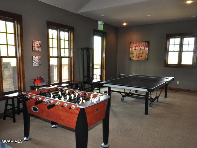 5202 Northstar, Unit 5202 Granby, CO 80446 - Photo 38 of 42 a living room with furniture pool table and a window