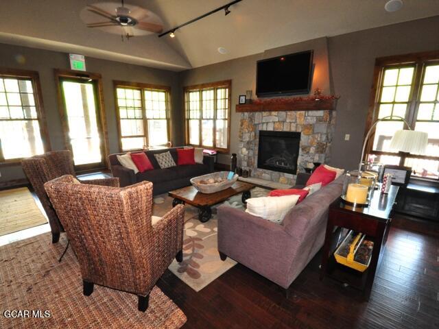 5202 Northstar, Unit 5202 Granby, CO 80446 - Photo 40 of 42 a living room with furniture fireplace and flat screen tv