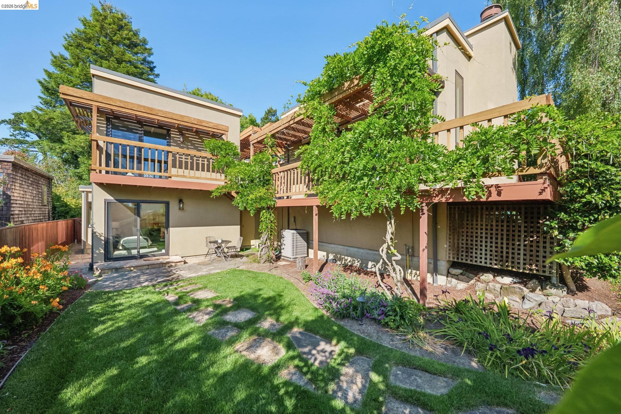 576 Vistamont Avenue Berkeley, CA 94708 - Photo 1 of 33 Tiered backyard featuring a manicured lawn and stepping stones