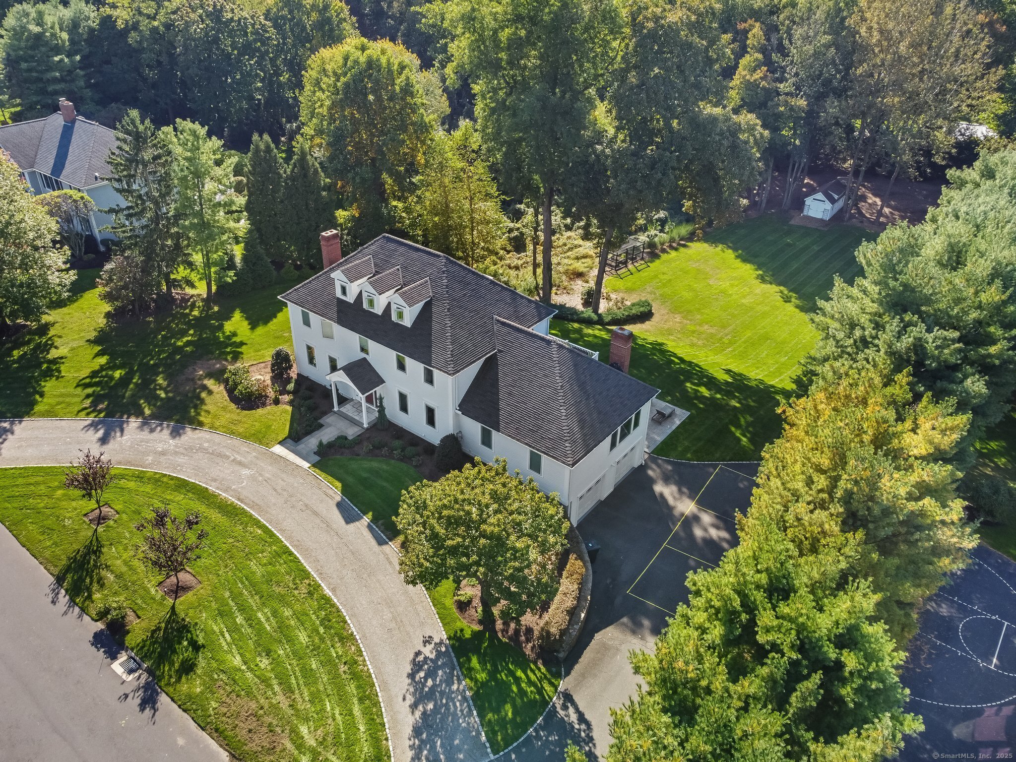 Welcome home! Aerial view showing the beautiful 1.35 acres that offers privacy however close proximity to all of the modern conveniences this town has to offer like a nice walk to Mill Hill school for starters!
